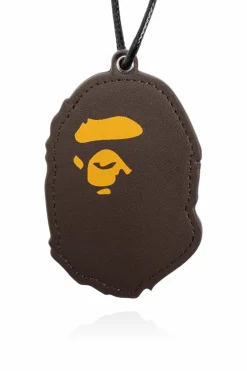 A BATHING APE® BROWN Logo pendant