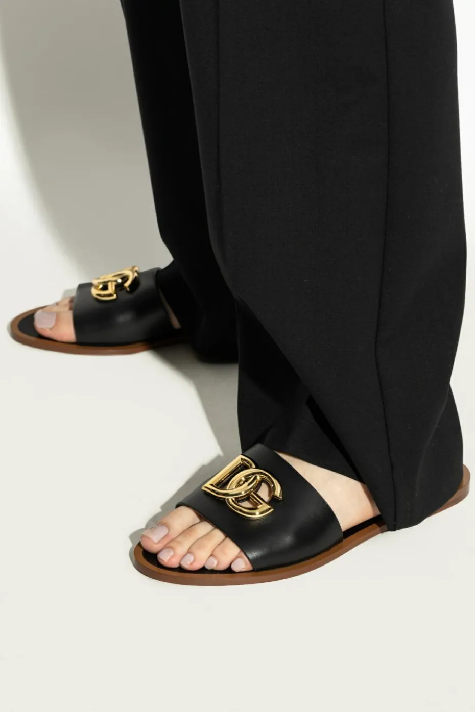 Dolce & Gabbana BLACK Leather slides with a logo-shaped appliqué