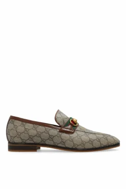 Gucci beige Monogrammed loafers