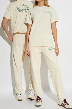 Sporty & Rich cream Sweatpants from the Wall Street collection