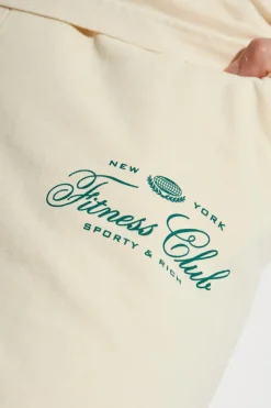 Sporty & Rich cream Sweatpants from the Wall Street collection