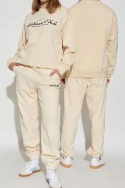 Sporty & Rich cream Trousers from the 'Riviera' collection