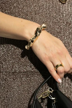 Tory Burch GOLD Bracelet with an asymmetric shape