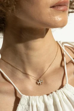 Tory Burch GOLD Necklace with a pendant in the shape of a logo